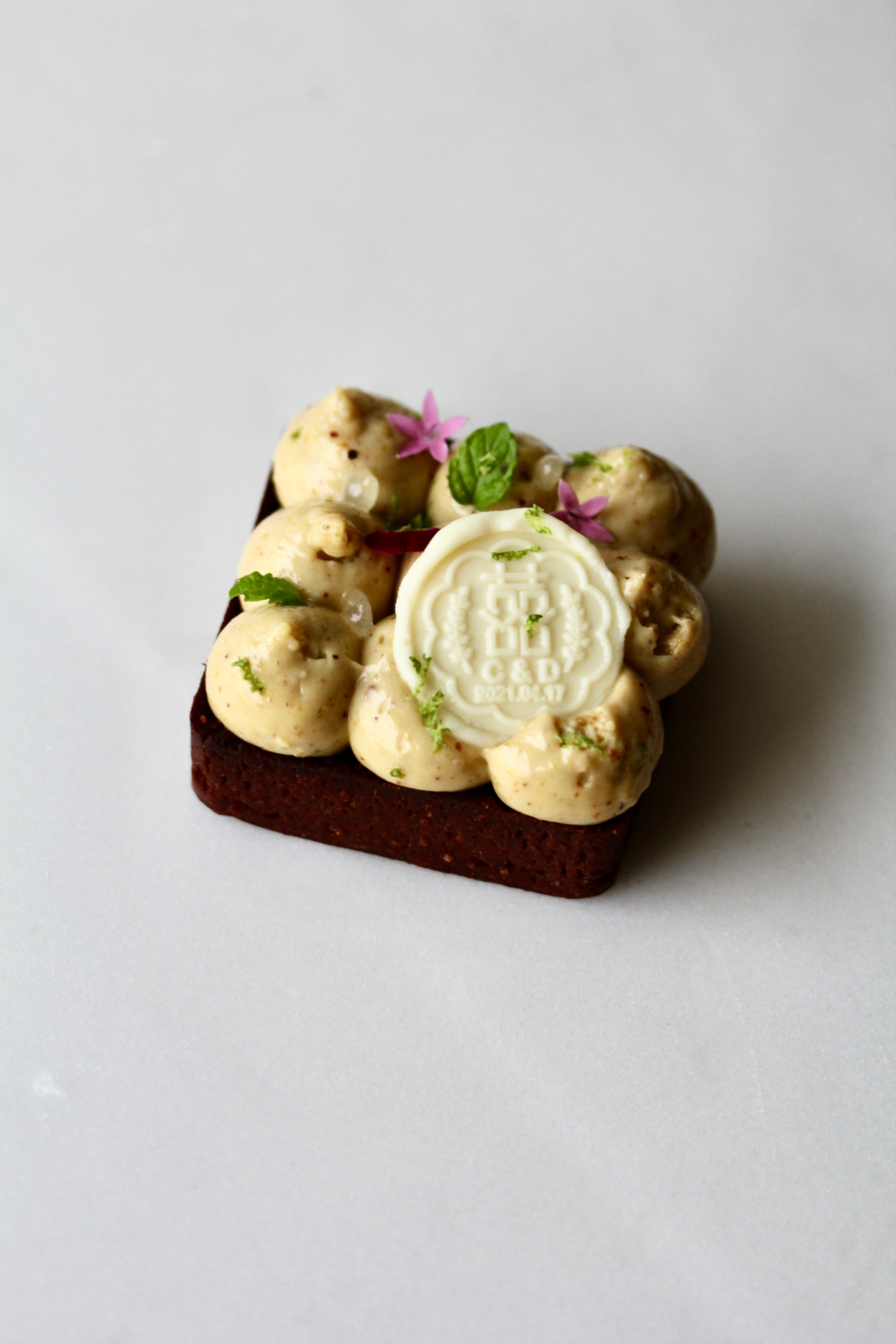 Pistachio chocolate tart custom made for a wedding