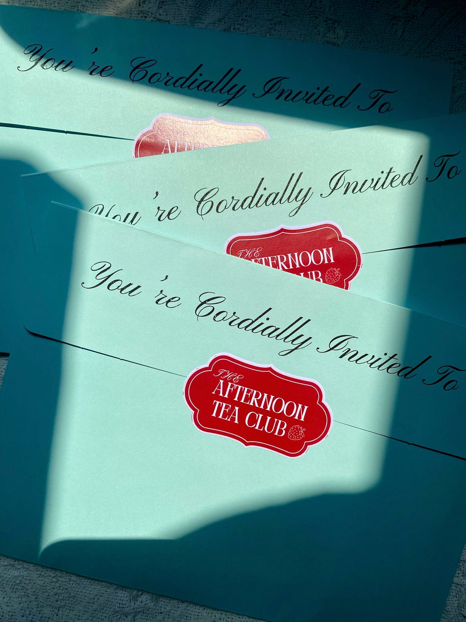 Envelopes with invitation message and sticker