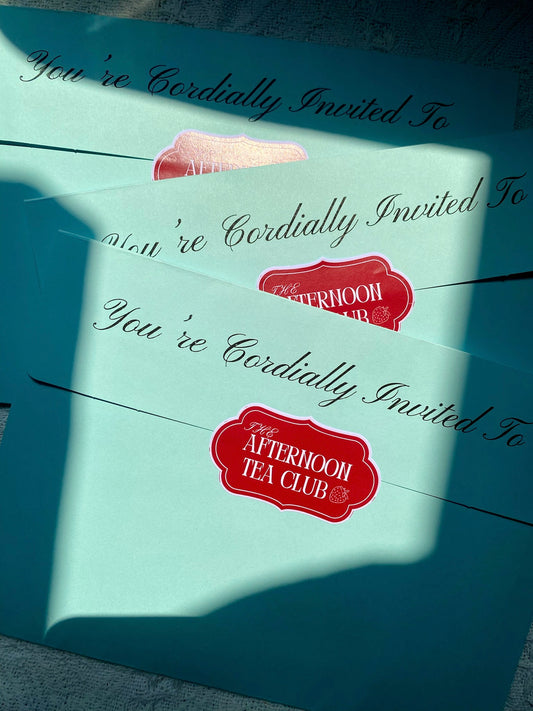 Envelopes with invitation message and sticker